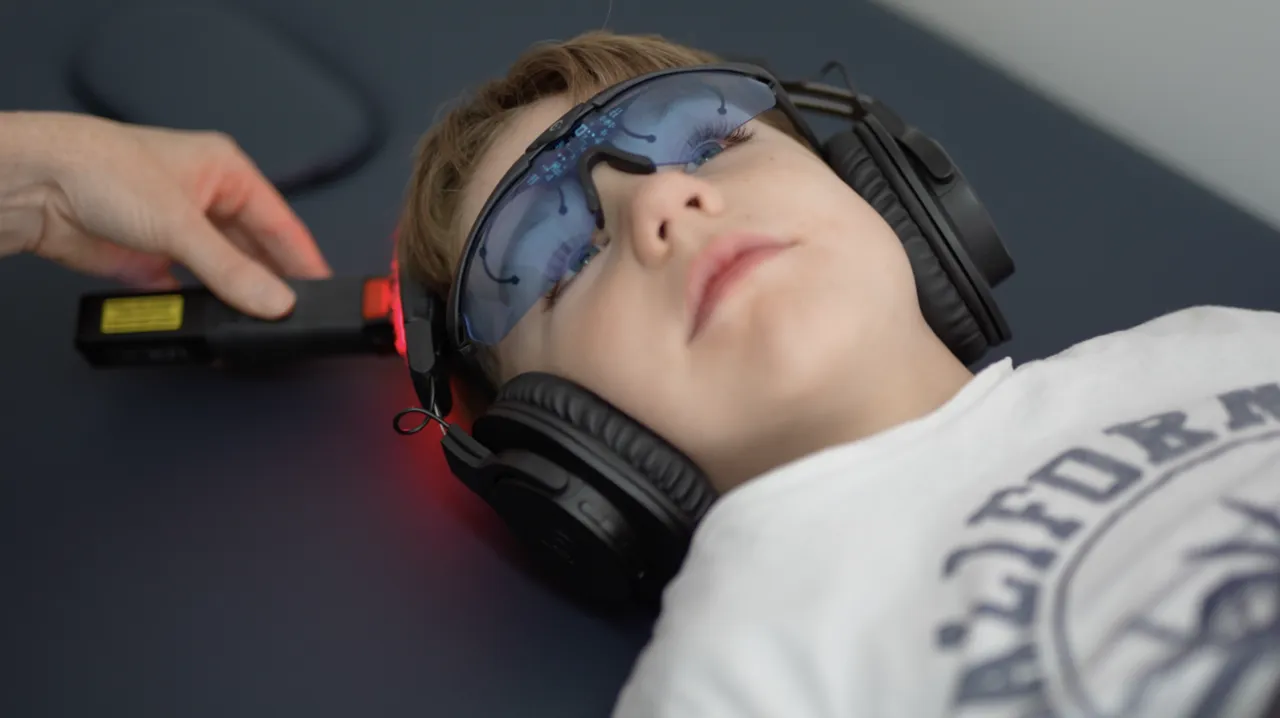 Child taking part in a neuro and postural rehabilitation activity