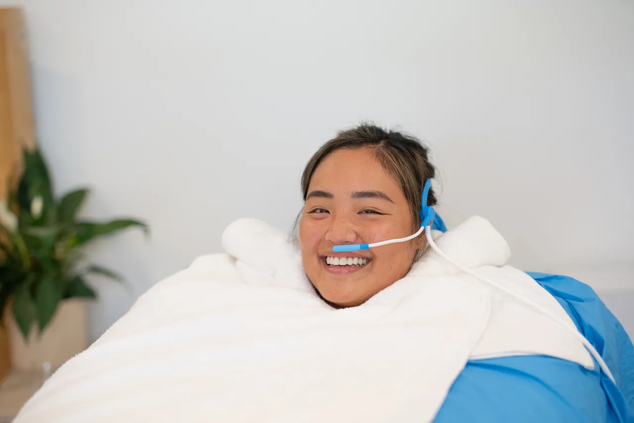 Patient relaxing during a HOCATT active oxygen session