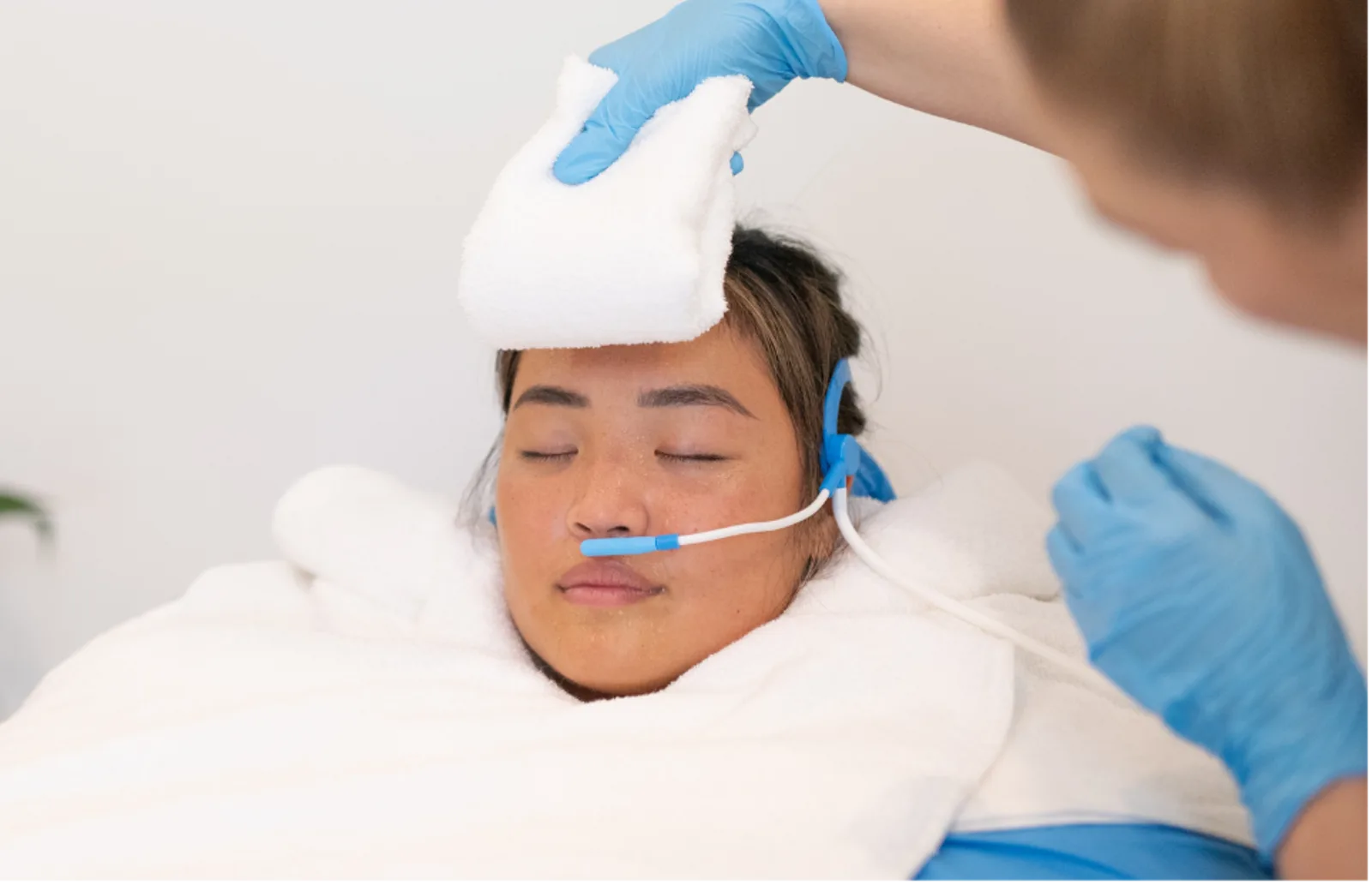 Patient resting during a supervised therapy session at the Inspiring Choices Gold Coast clinic
