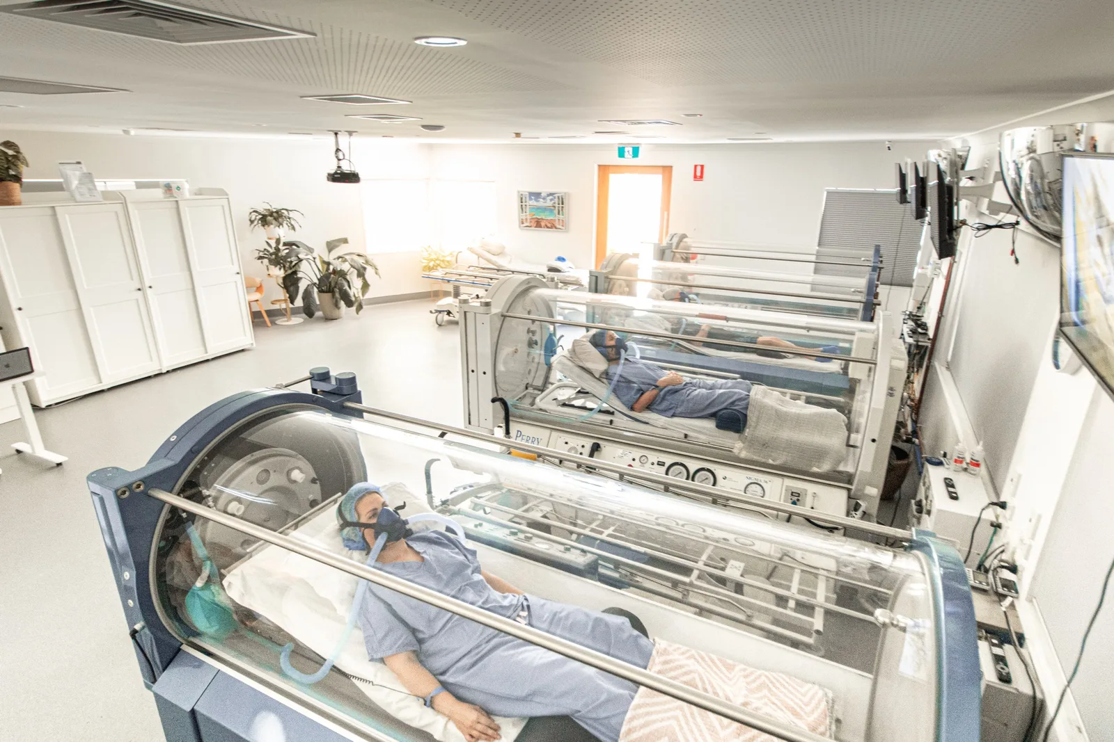 Patient resting in the hyperbaric oxygen therapy suite