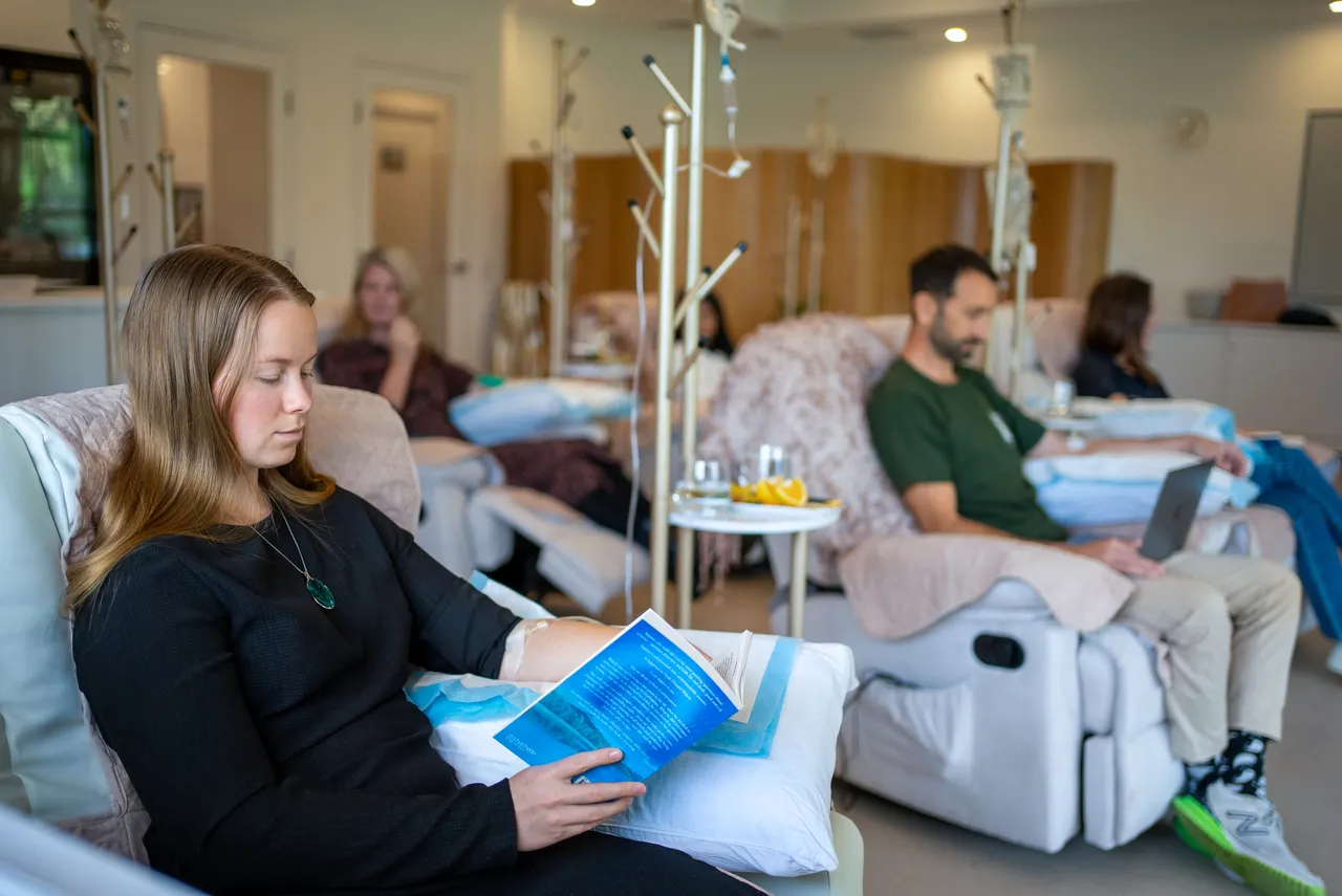 Patients relaxing in the vitamin IV therapy lounge at the Gold Coast clinic