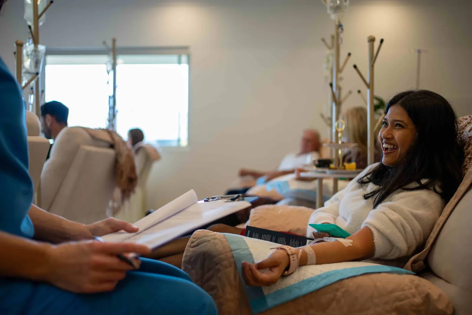 Patient comfortably receiving vitamin IV therapy on the Gold Coast
