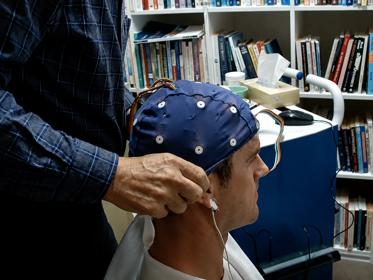 EEG cap being fitted for a qEEG brain-mapping session at the Gold Coast clinic