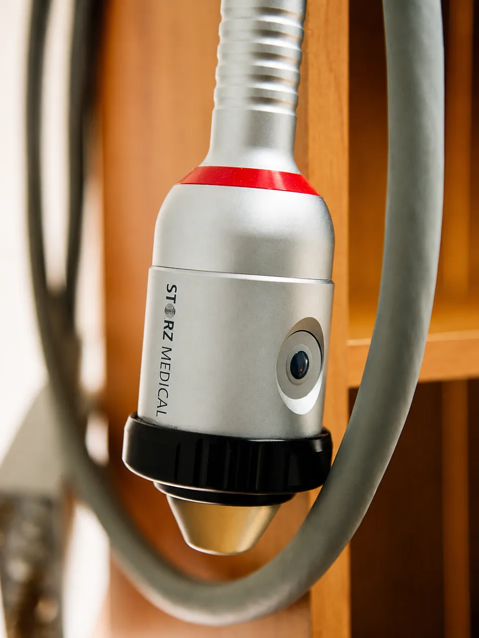 Close-up of a shockwave therapy handpiece at the Gold Coast clinic